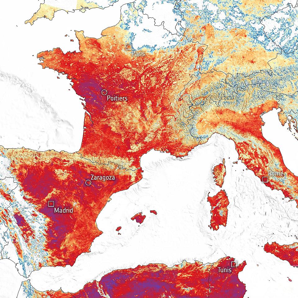 Carte des températures au sol le mercredi 23 juin, mesurées par satellite. L'Europe de l'ouest et en particulier la France sont colorées du orange foncé au pourpre, de même que le centre de l'Espagne et le nord du Maghreb.